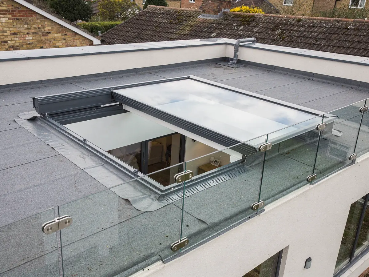 Sliding rooflight slid open on a roof terrace