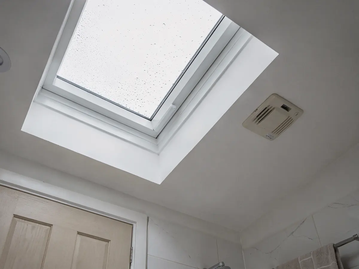 Clear dry rooflight in a bathroom ceiling