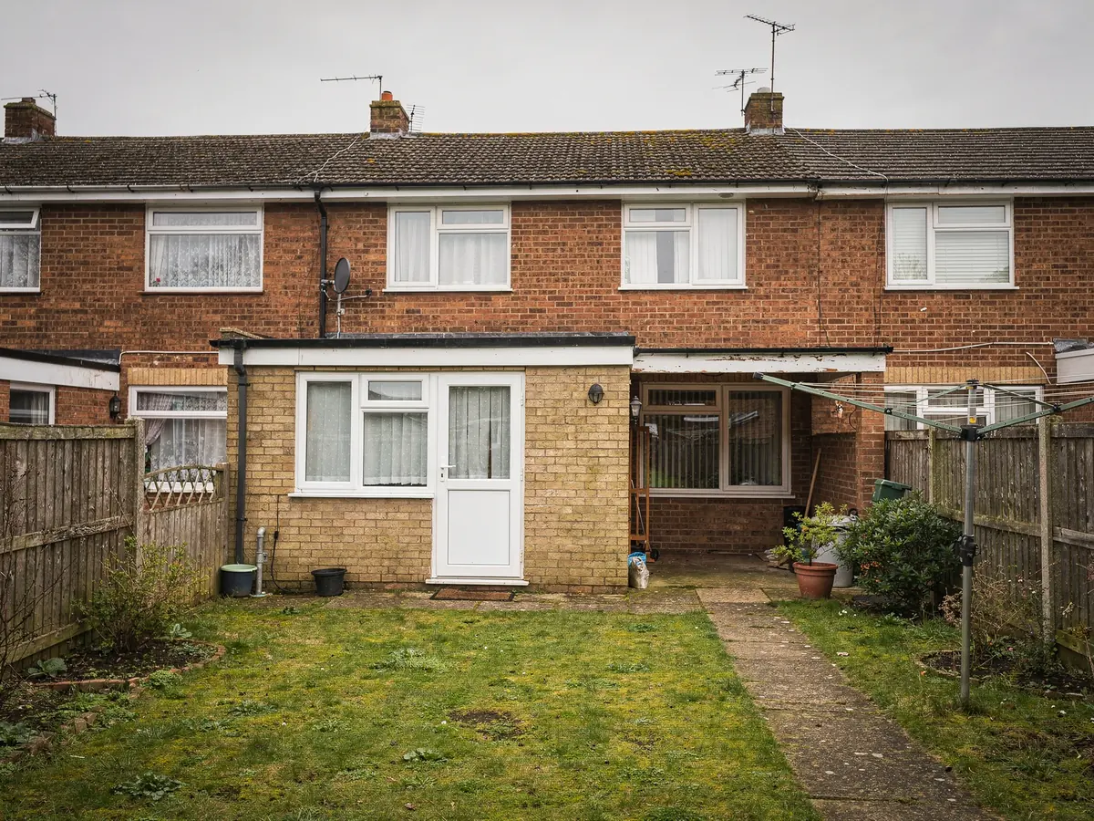 1970s brick house with a flat-roofed rear extension