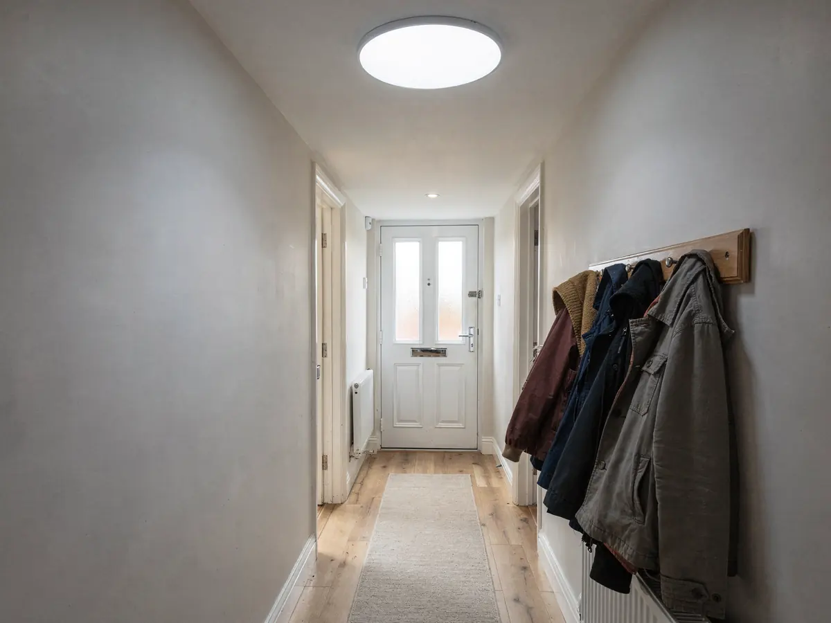 Hallway with a round daylight diffuser in the ceiling