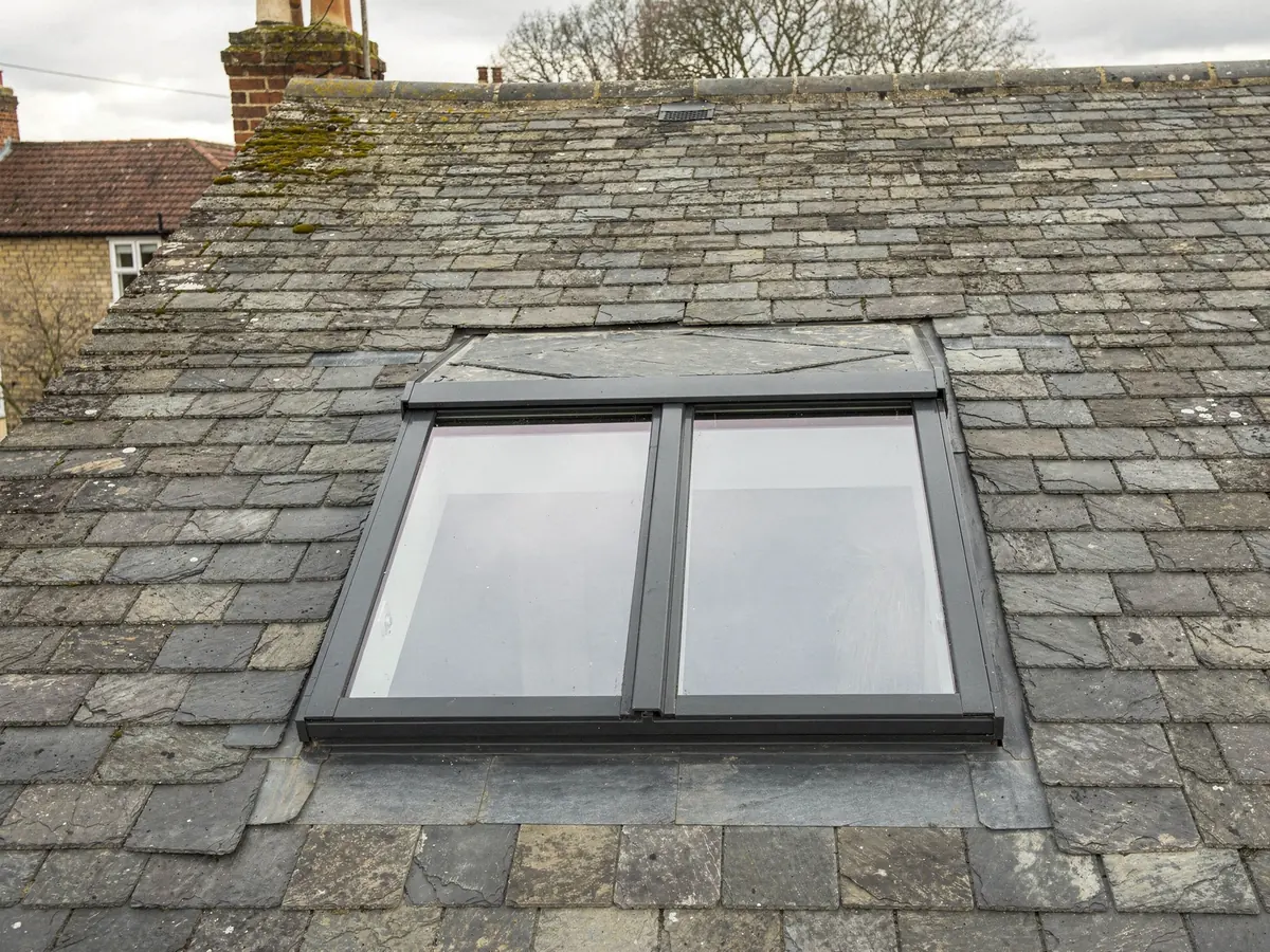 Conservation rooflight with a central glazing bar in slate
