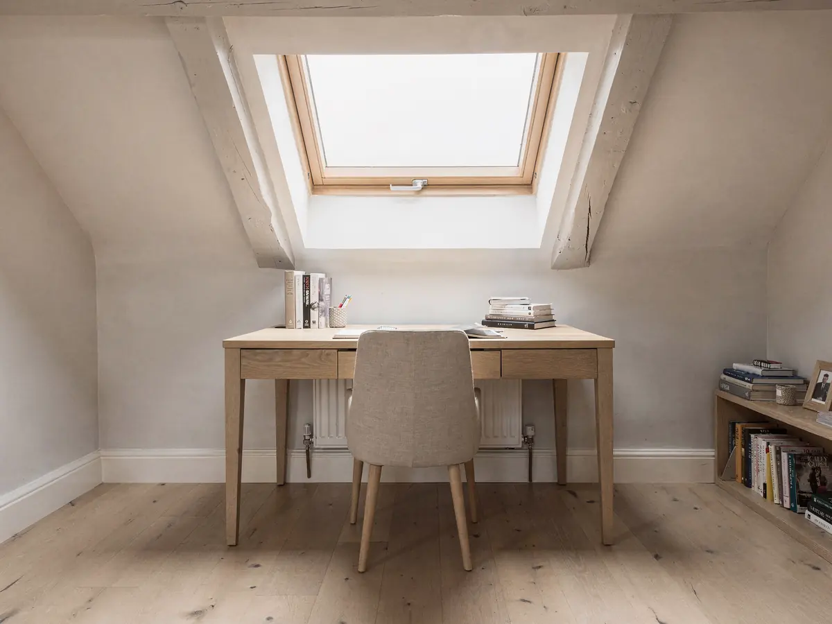 Loft conversion study under a roof window